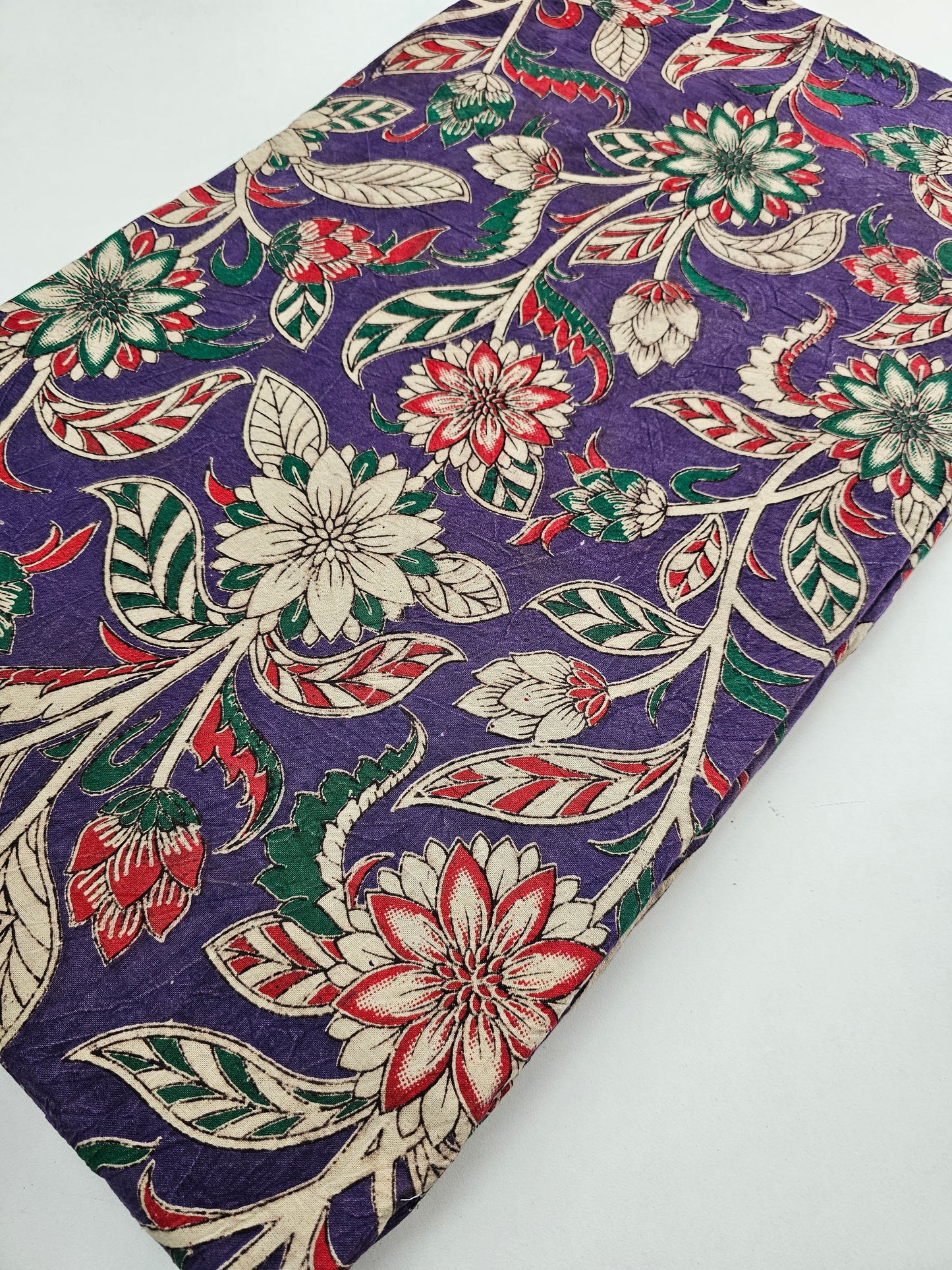 Kalam Kari Fabric purple with Red, Green colour Flower design.